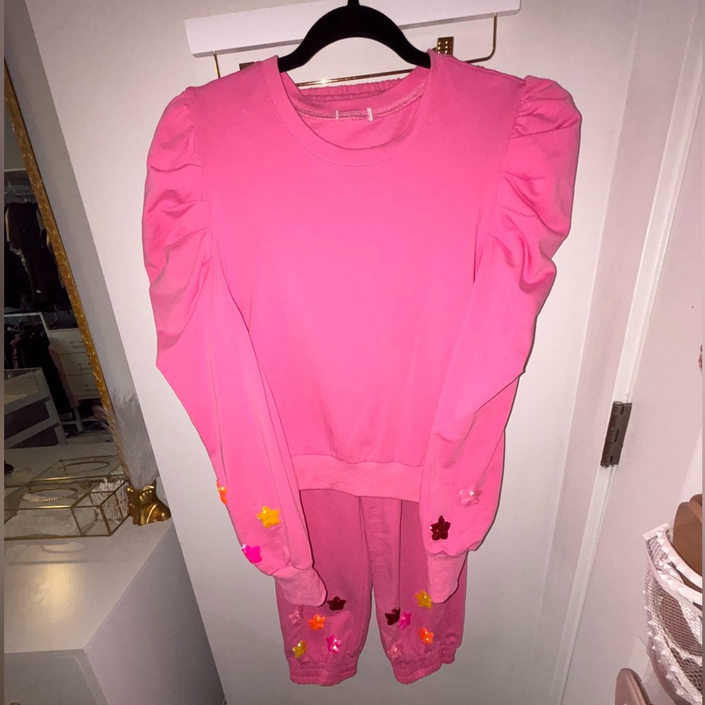 Adorable pink set with sequin flowers.